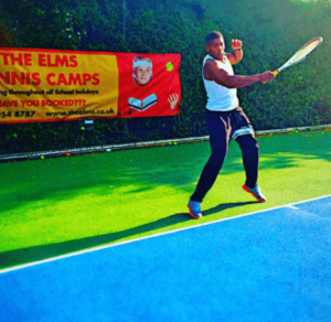 Anthony Joshua playing tennis